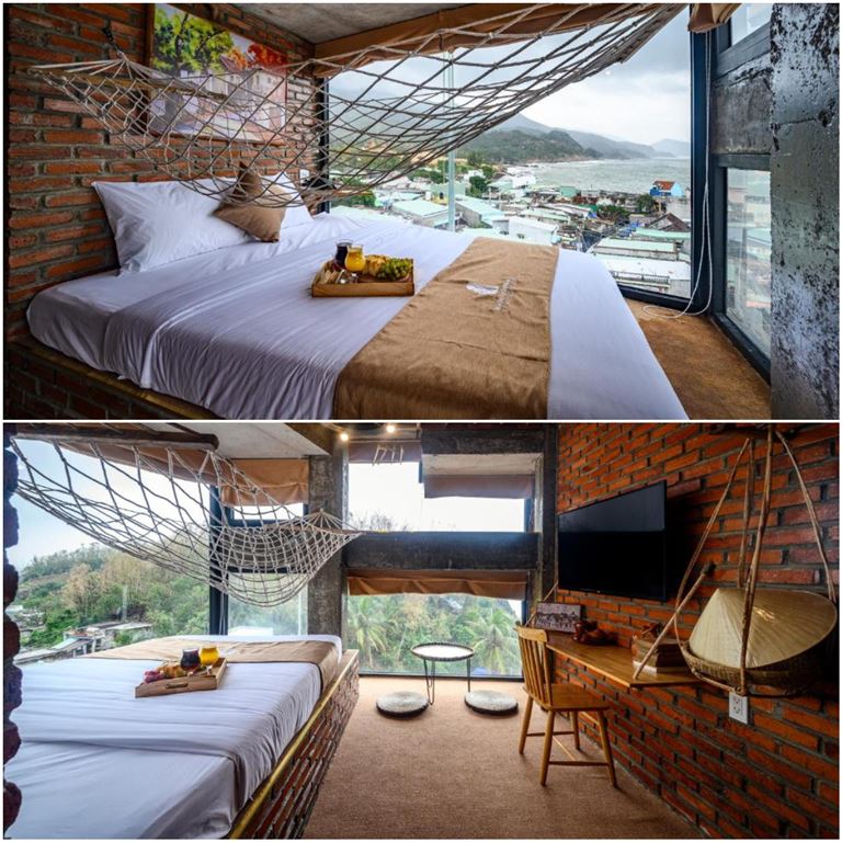 Phòng đôi Việt Nam được thiết kế theo phòn cách Việt Nam mộc mạc với tường kính lớn nhìn ra biển thơ mộng. 