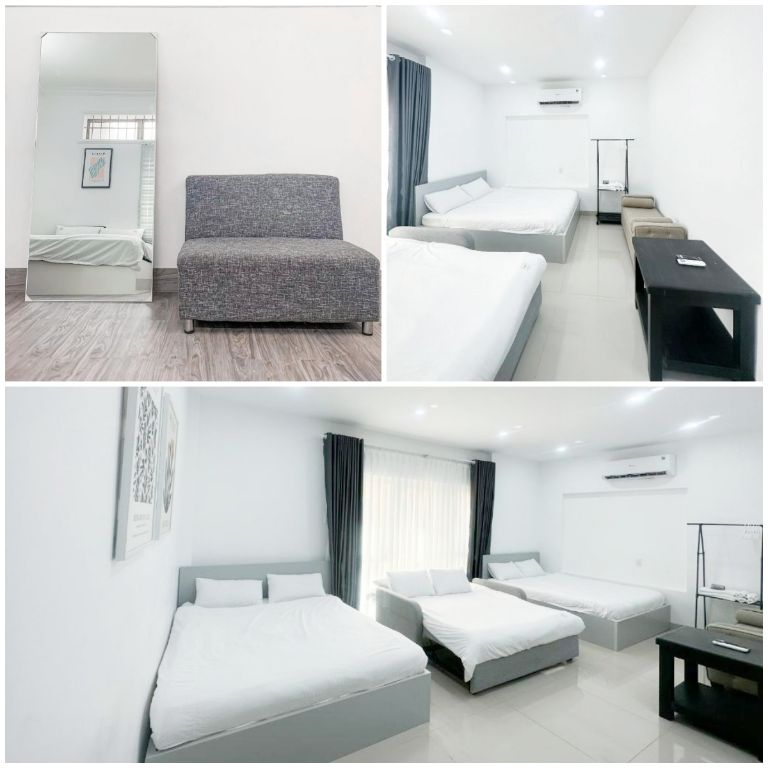 Phòng 3 giường ngủ được bố trí 1 gương soi toàn thân và sofa mini, đảm bảo tiện nghi và thoải mái cho khách. (Nguồn: Internet)