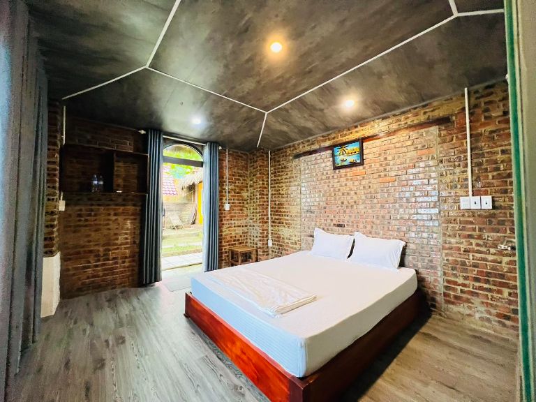 Phòng nghỉ sử dụng tông màu trung tính làm gam màu trang trí chính, kết hợp không gian mở thoáng mát