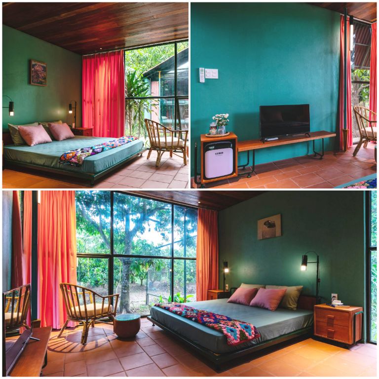 Phòng ngủ nhà mái đỏ trong khu garden được thiết kế theo phong cách cổ điển, sang trọng với gam màu xanh cổ vịt làm chủ đạo. (Nguồn: Internet)
