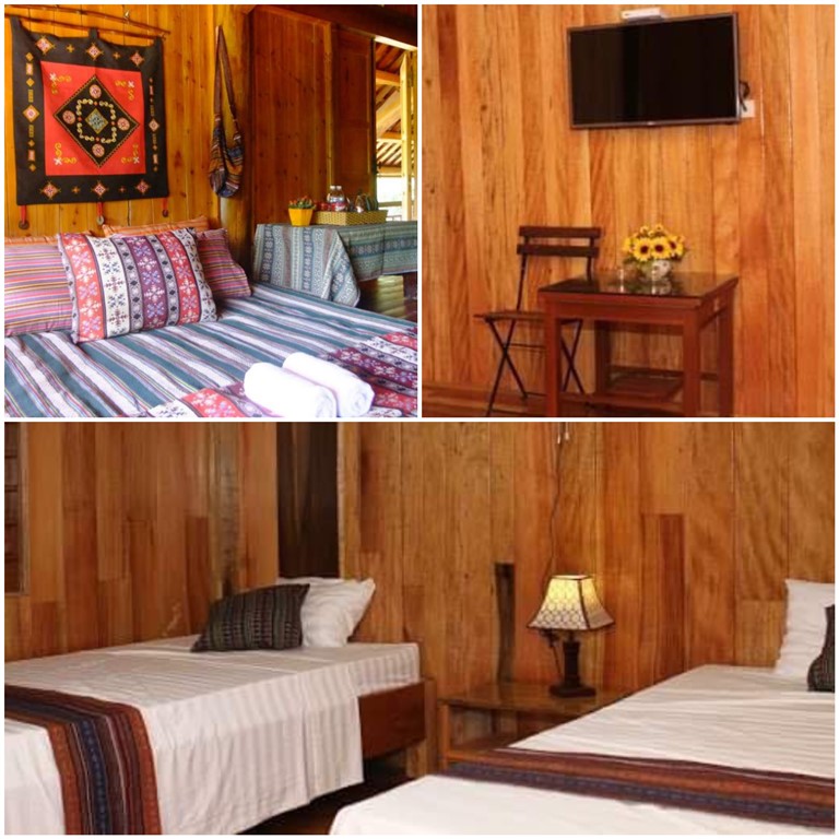 Không gian nghỉ dưỡng ấm cúng trong phòng nghỉ đôi, trang bị nội thất gỗ ấm cúng.