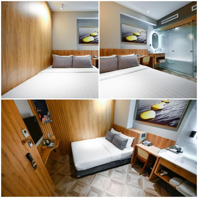 Phòng ngủ đôi nhỏ có diện tích khoảng 15m2 có thiết kế nhà tắm kính với không gian mở với phòng ngủ nên tiết kiệm được nhiều không gian phòng cho du khách. (Nguồn ảnh: Booking.com)