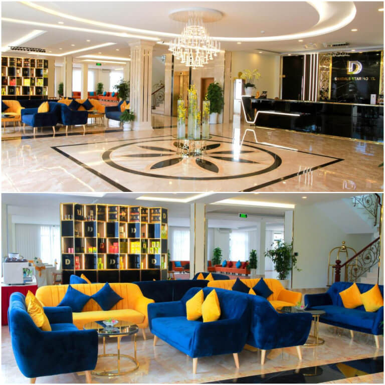 Không gian bên trong khách sạn sang trọng với tông màu ấm được bố trí hệ thống sofa nhiều màu sắc.