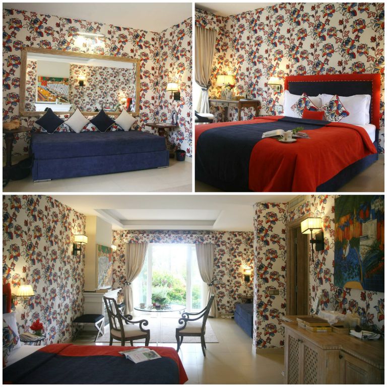 Một căn phòng Suite khác mang tông màu trầm ấm (navy blue và scarlet red), tạo cảm giác mạnh mẽ, cá tính và đầy cuốn hút. (Nguồn: Internet) 