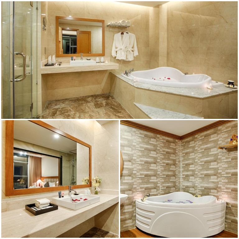 Phòng tắm riêng tư tại hạng phòng Deluxe King sở hữu một bồn tắm có cấu trúc uốn lượn độc đáo. (nguồn: booking.com)