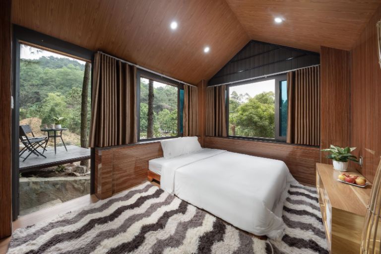 Các phòng nghỉ của resort được thiết kế tối giản nhưng đầy đủ tiện nghi hiện đại. (nguồn: Booking.com).