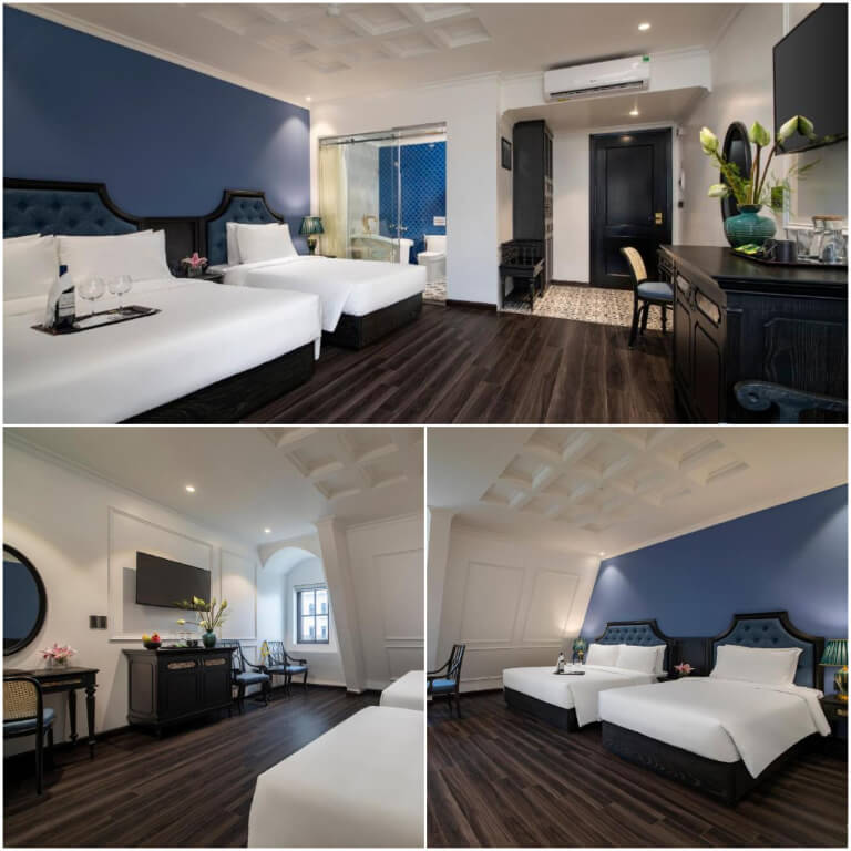 Phòng Family Suite Room nổi bật với hệ thống tường trắng và xanh dương đậm khá đẹp mắt.