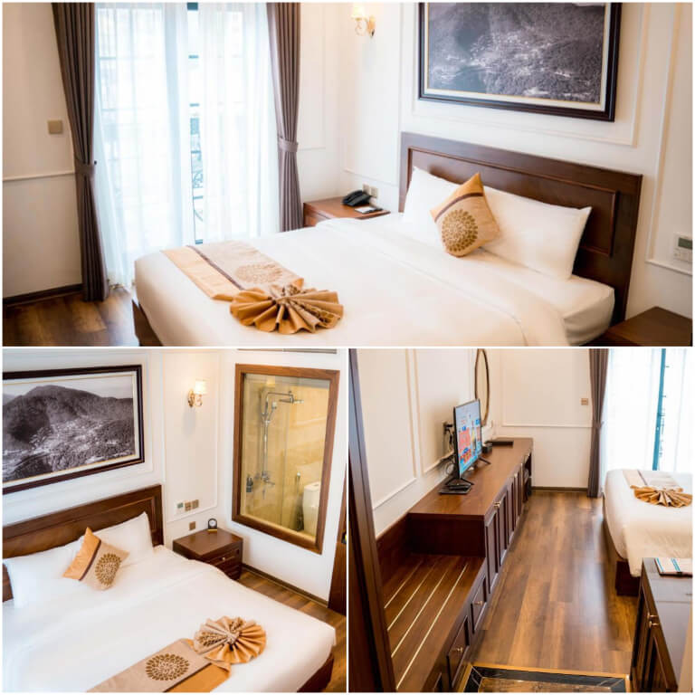 Phòng ngủ ấm cúng được sử dụng nội thất gỗ từ nền và các vật dụng xung quanh.