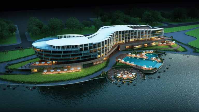 Khách sạn nằm bên Đầm Vạc, được thiết kế hình sóng nước mới lạ.