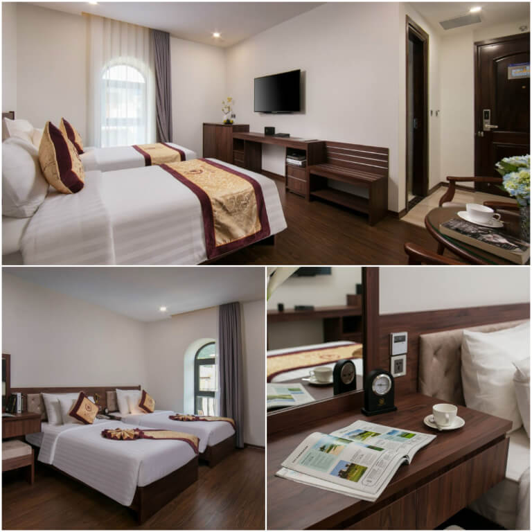 Phòng Classic Twin được bố trí 2 giường đơn liền kề, nổi bật với tone nâu gỗ.