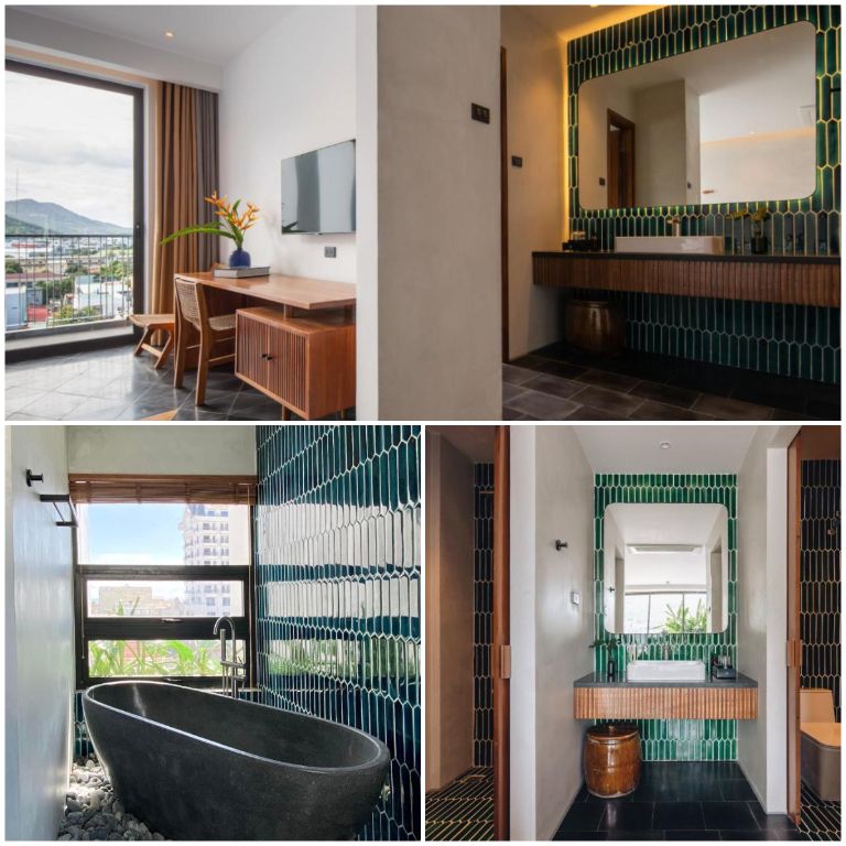  Phòng tắm trong Phòng Executive được trang bị bồn tắm và vòi sen riêng biệt, cùng với các tiện nghi khác như gương trang điểm và đèn chiếu sáng tốt.