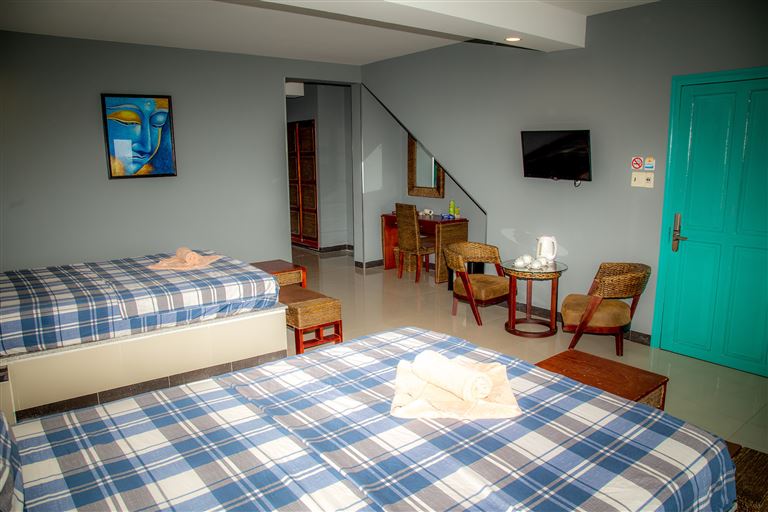 Hạng phòng gia đình trang bị hai giường đôi và nhiều tiện ích đẳng cấp, đời mới cho khách hàng. 