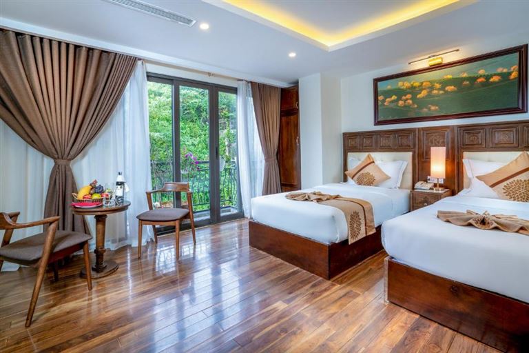 Phòng Deluxe tại Sapa Relax Hotel & Spa có diện tích rộng rãi, trnag bị giường đôi hoặc giường đơn tùy theo nhu cầu khách hàng. 