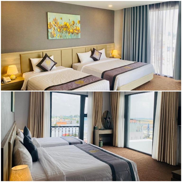 Không gian phòng nghỉ tại khách sạn Hera Luxury Hotel thoáng đãng, sử dụng các gam màu trung tính hiện đại.